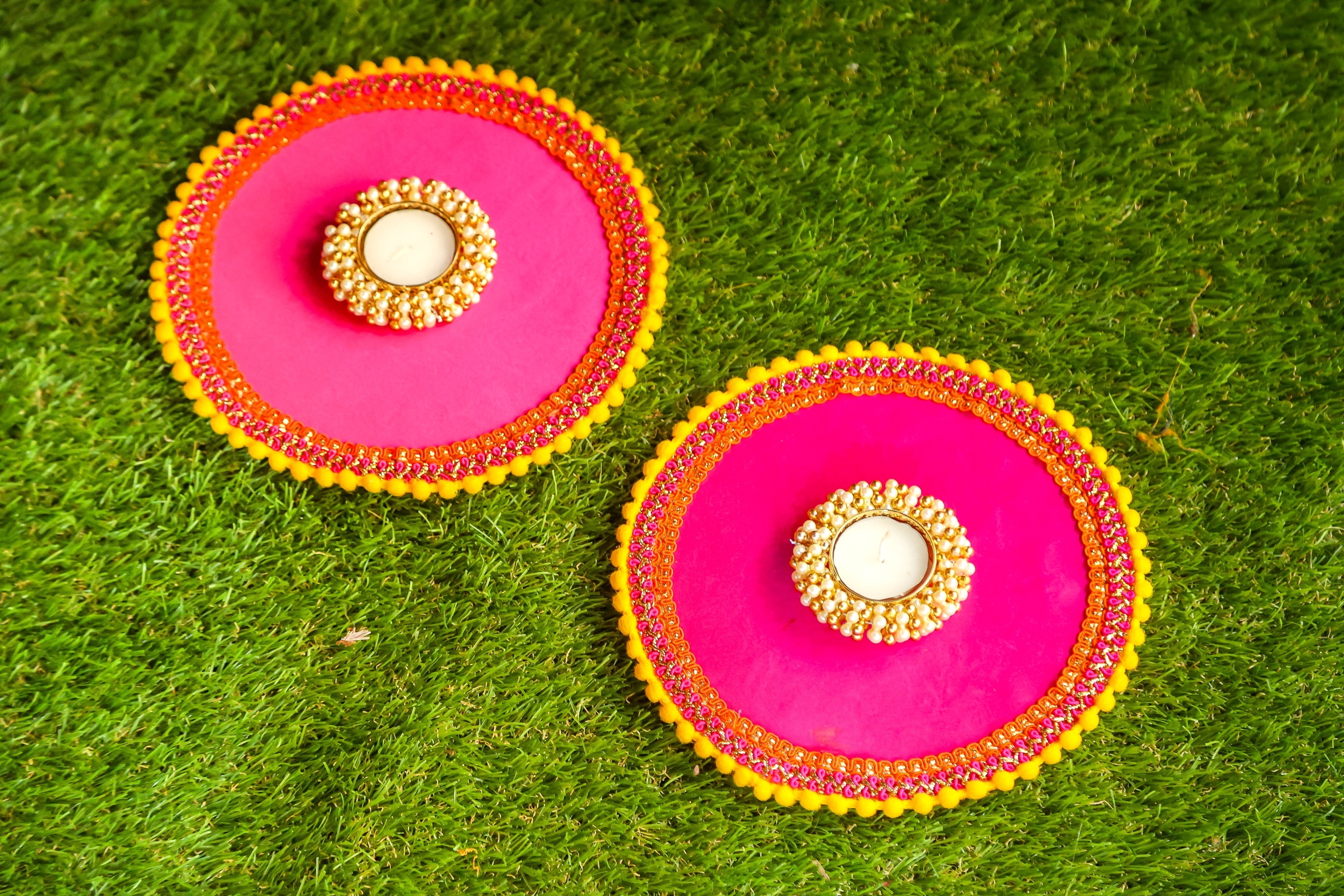 Yellow Pink Pompom Rangoli 