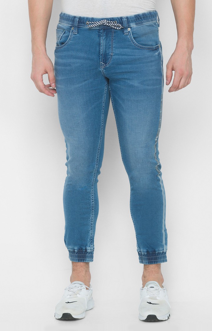 Spykar | Spykar Mid Blue Solid Slim Mid-Rise Joggers Jeans (Kano)