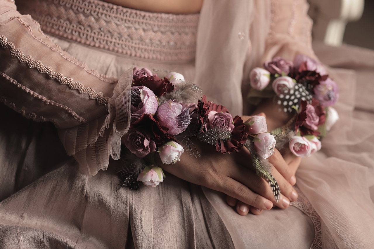 Floral corsages with feathers