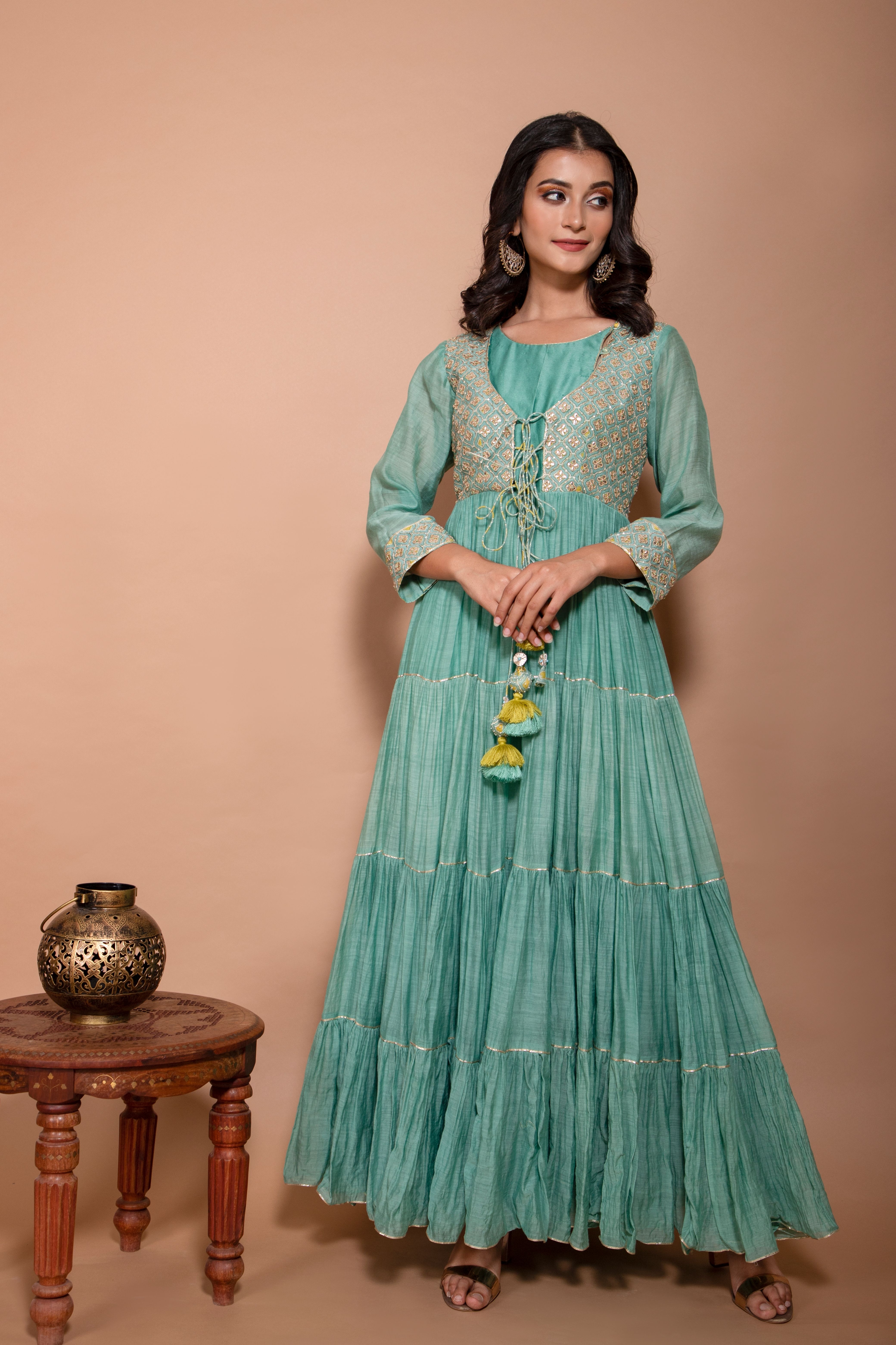 Tiered chanderi dress with gota work on the yoke and tassels in the front with shaded dupatta