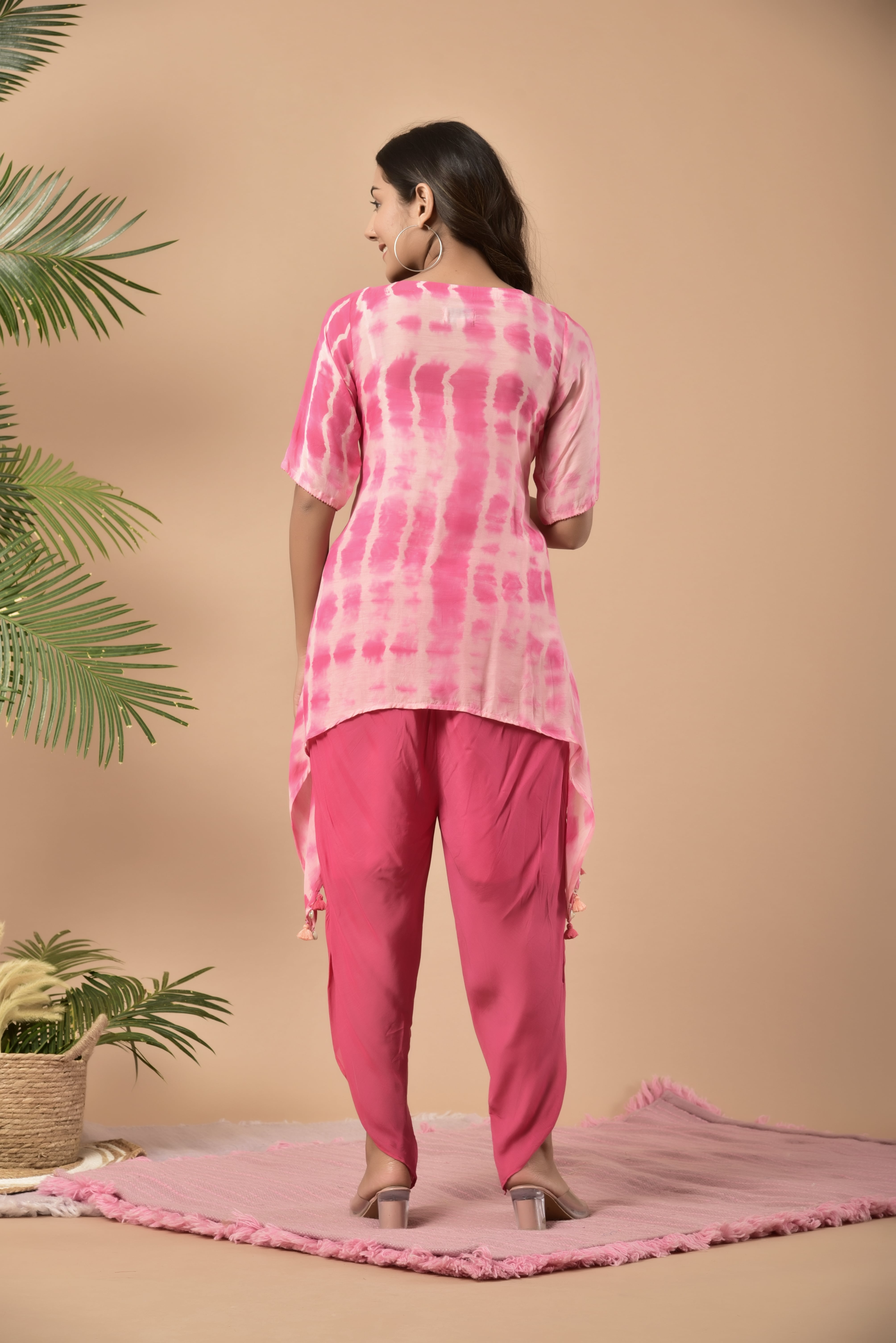Pink shibori a - symmetrical top paired with dhotti pants