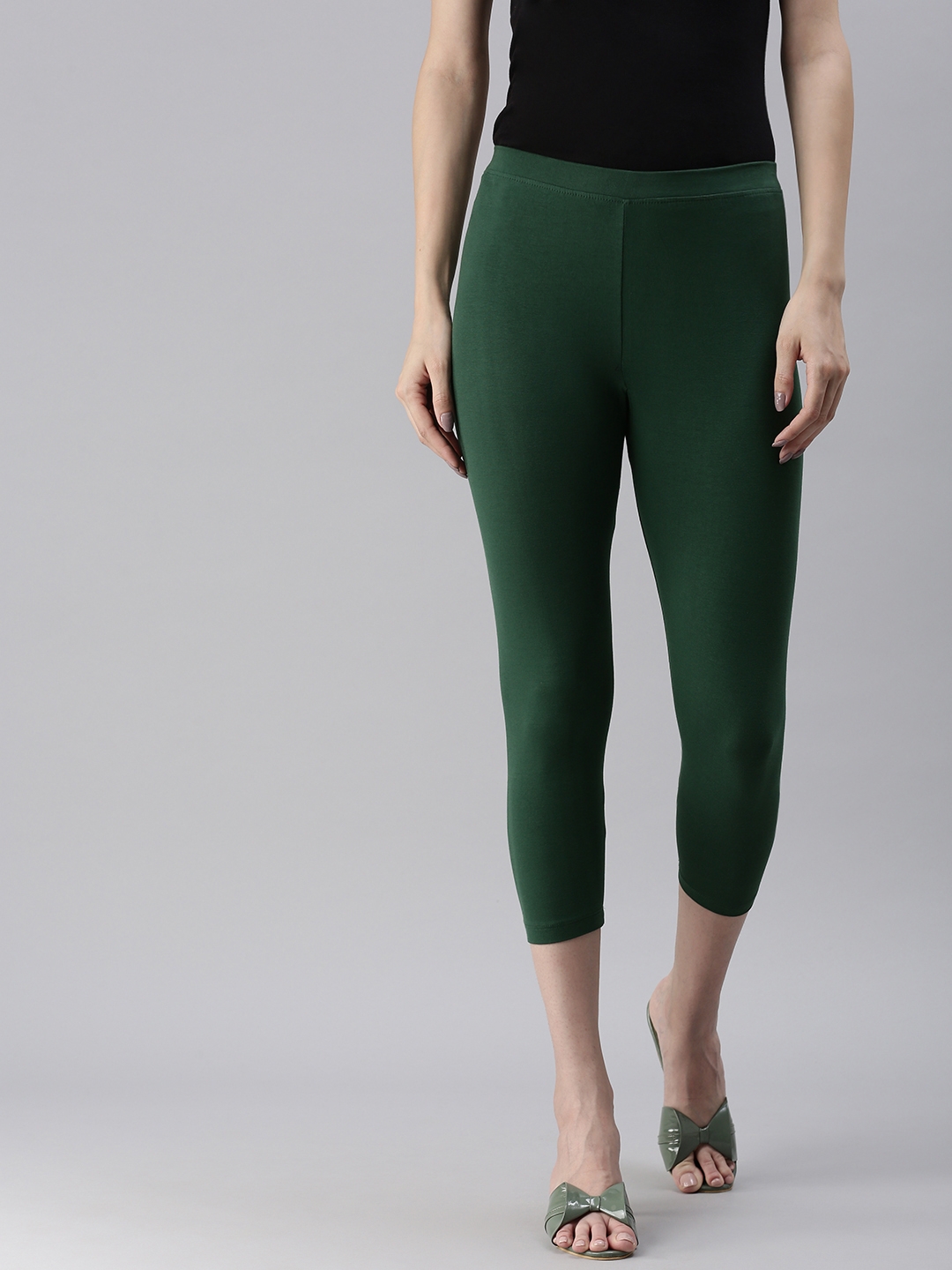 Kryptic | Kryptic Women Cotton Stretched Solid Bottle green colour Mid-Ankle length Legging