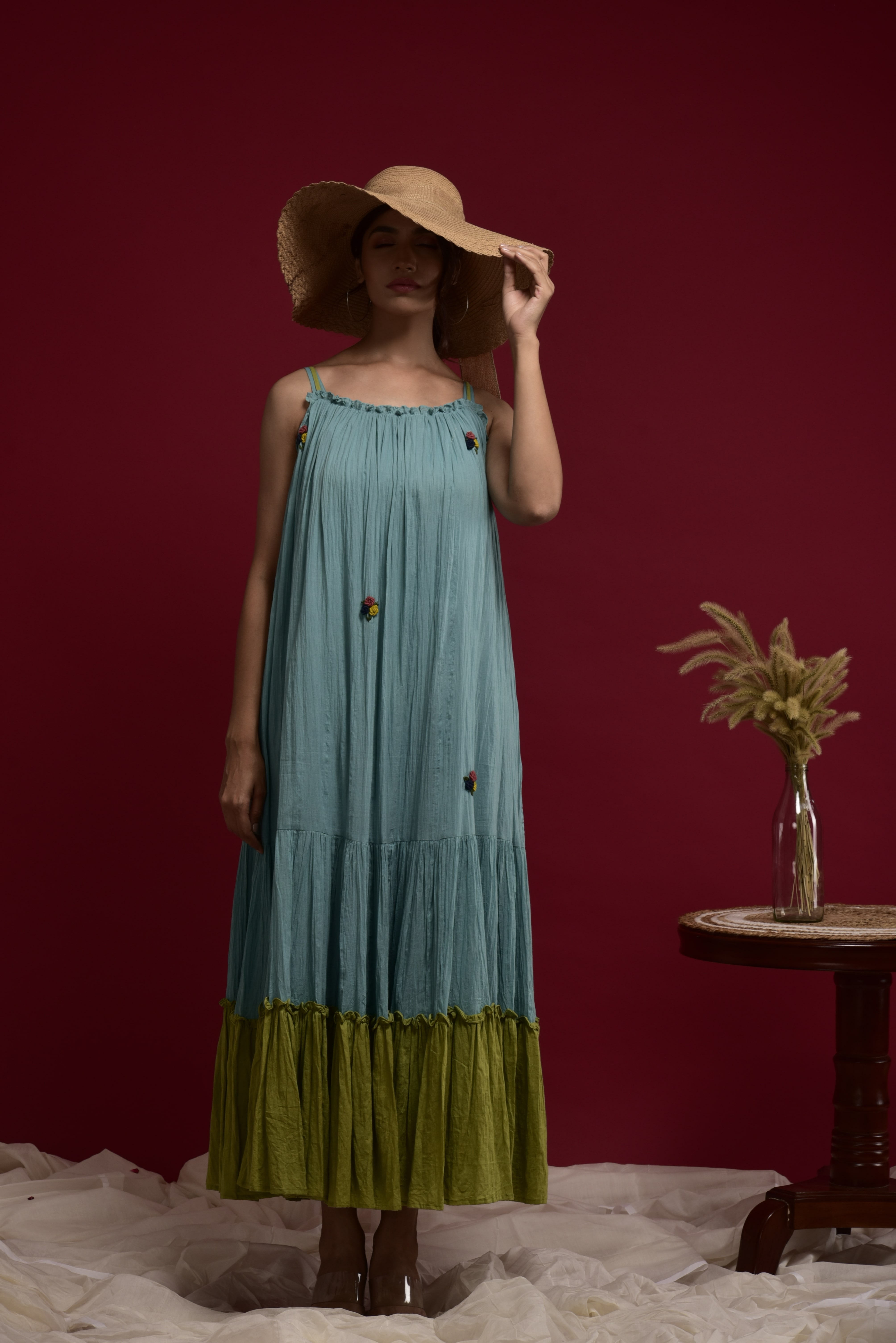 Blue and green tiered dress with hand anchor work on first panel