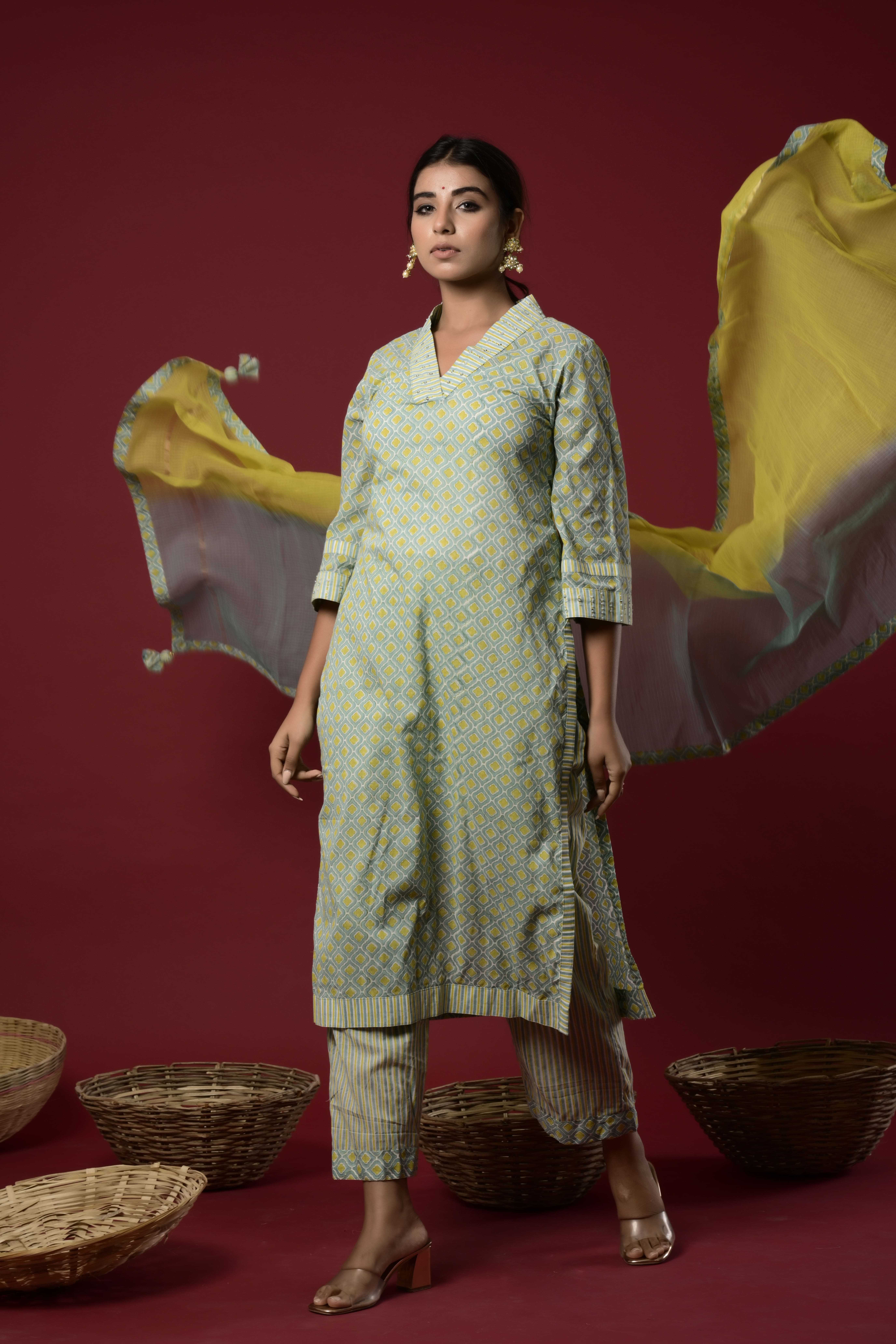 Block printed v- neck straight fit kurta with pant and kota doria shaded dupatta with tassels and with a little embellishment on collar and cuffs