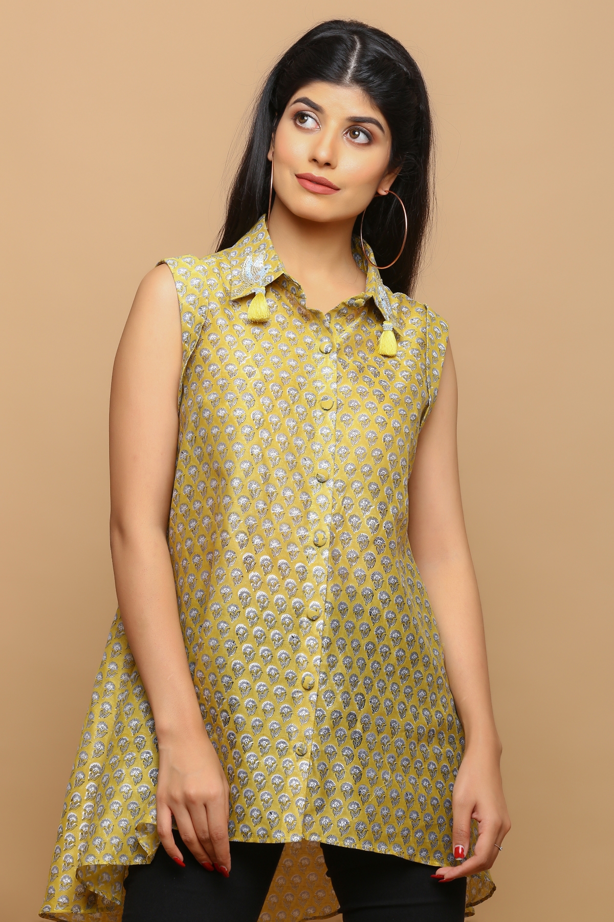 Chanderi a- symetrical top with hand work detailing on the collar