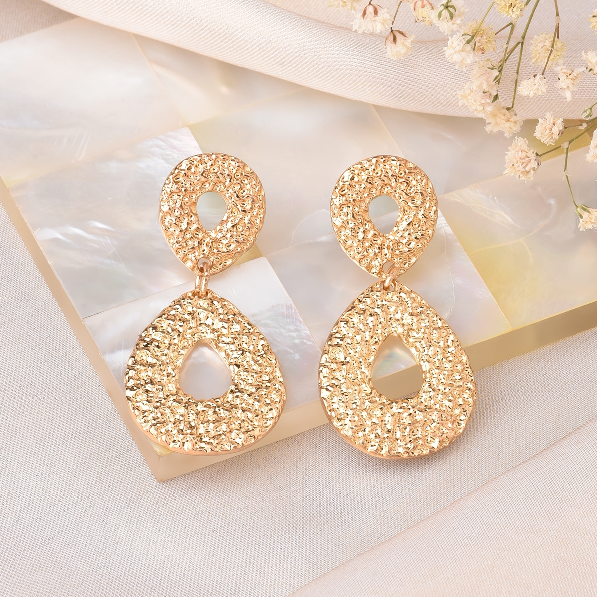Lilly & sparkle | Lilly & Sparkle Gold Toned Drop Shaped Textured Dangler Earrings