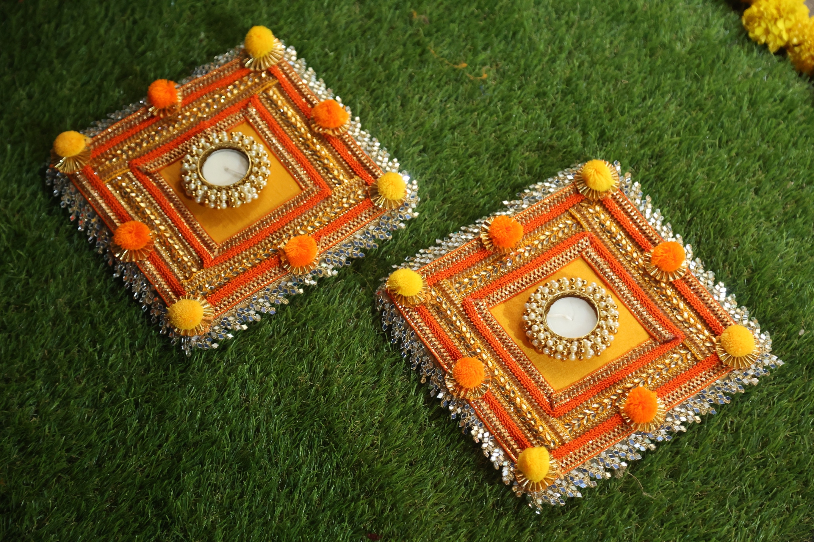 Orange Yellow Pompom Rangoli 