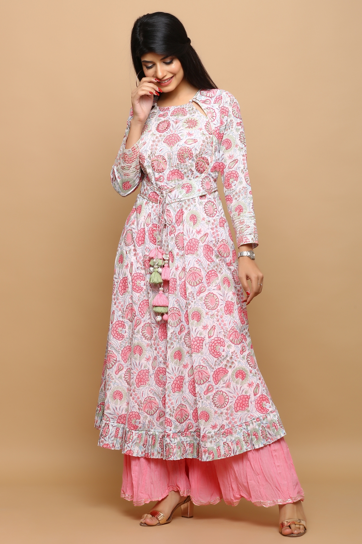White jal anarkali with work in the centre and pink shrara