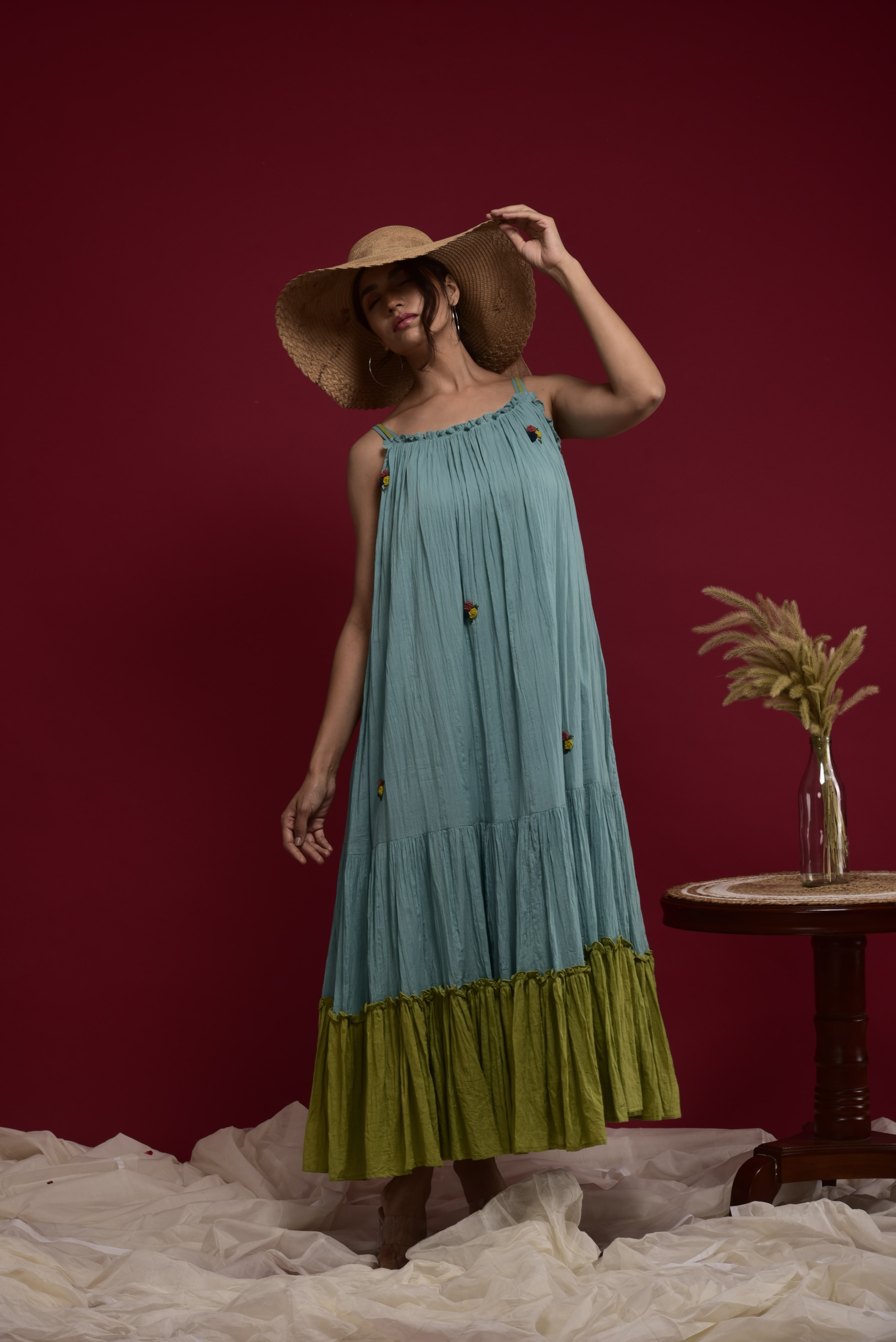 Blue and green tiered dress with hand anchor work on first panel