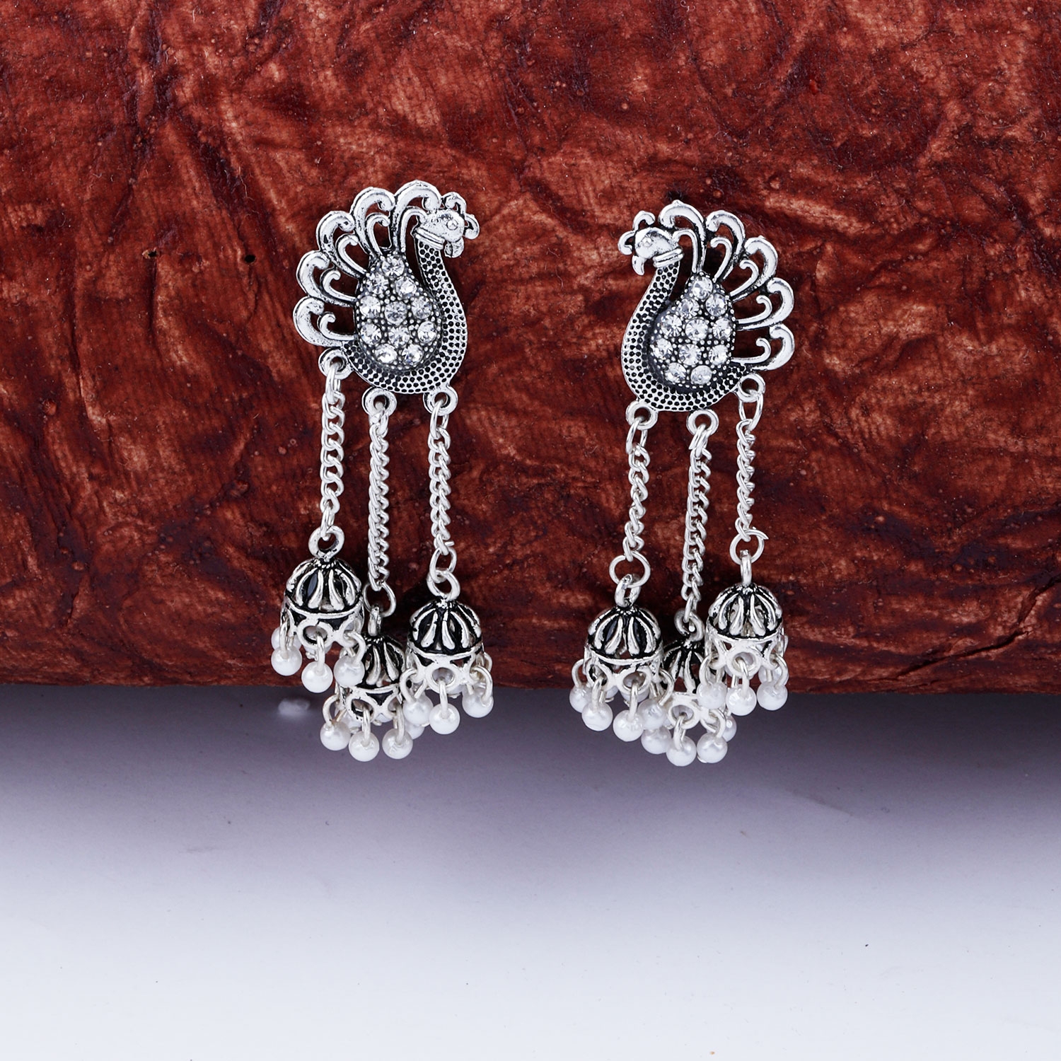 SILVER SHINE |  Dazzling Silver Peacock Tassel Jhumki Earrings for Women