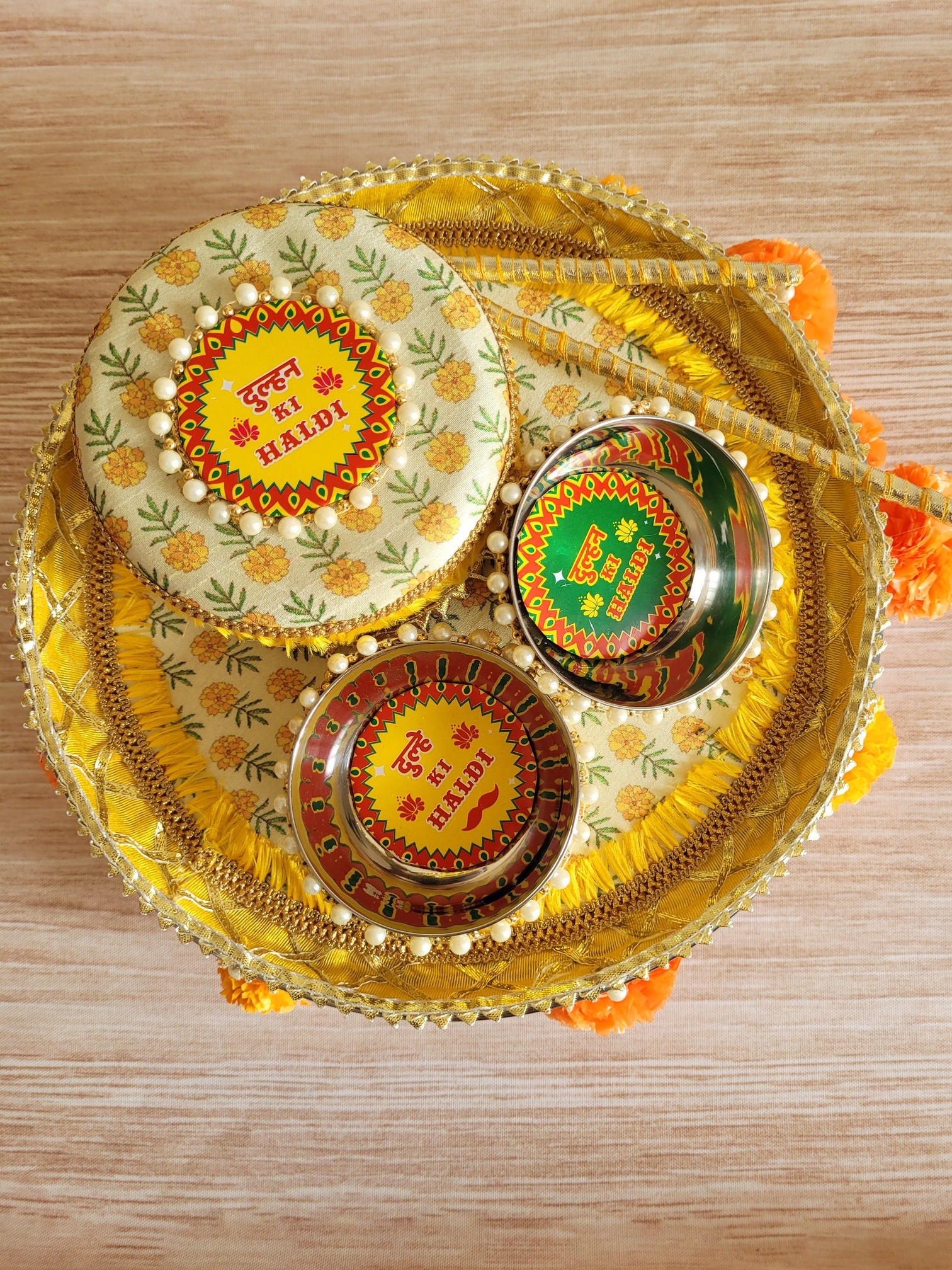 Yellow Haldi platter with Artificial Flower Marigolds